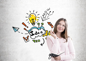 Smiling teen girl in a pink shirt, business idea