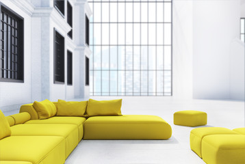 Yellow sofas in an office waiting area