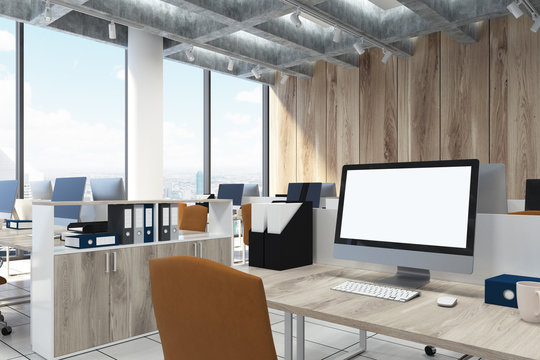 Wooden open office, computers closeup