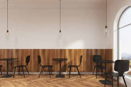 Modern black furniture cafe interior, window