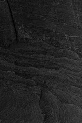 Dark grey black slate background or texture.