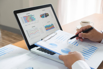 businessman working plan the business and analysis many chart graph