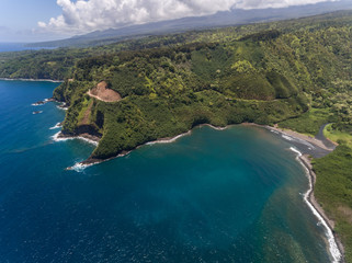 Aerial view of the Maui coastline at Honomanu Park and the road to Hana