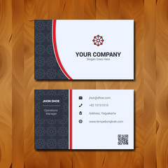 Simple Business card template design with company logo on wood background