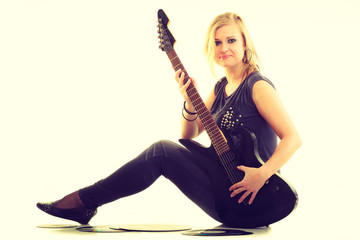 Fototapeta premium Woman with electrical guitar and vinyl record.