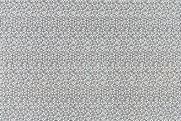 white wall with geometric pattern with holes