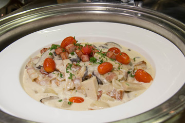  fish with cream sauce and vegetable