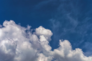 background of a blue sky with a white clouds