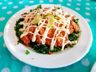 Chicken Salad topped with a lemon cream sauce.