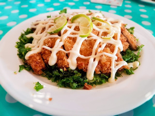 Chicken Salad topped with a lemon cream sauce.