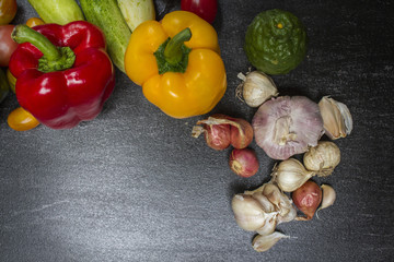 Organic vegetables on dark background concept.Top view with copy space. Raw food background.