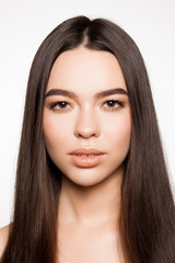 Fototapeta premium Front portrait of beautiful woman on white