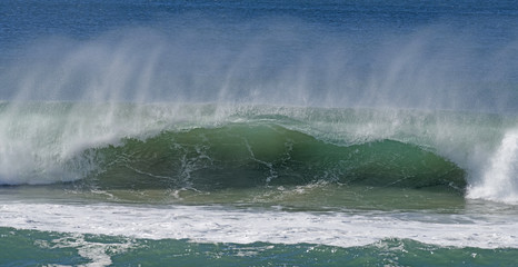 Ocean surf breaking along the Queensland coast, Australia