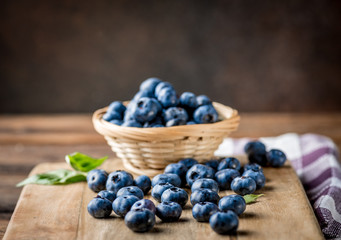 Tasty blueberries fruit in bowl. Blueberries are antioxidant organic superfood.