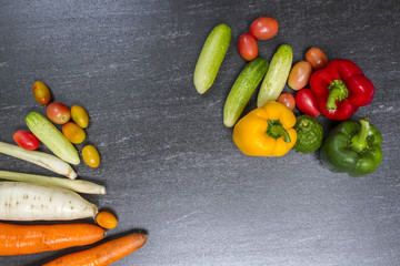 Organic vegetables on dark background concept.Top view with copy space. Raw food background.