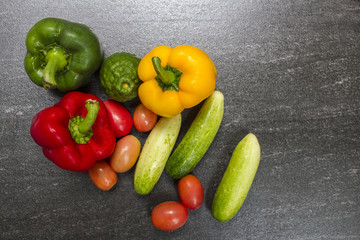 Organic vegetables on dark background concept.Top view with copy space. Raw food background.