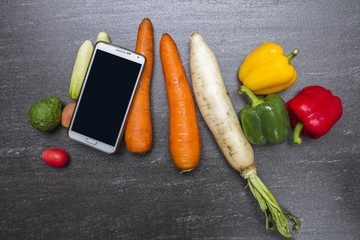 Organic vegetables on dark background concept.Top view with copy space. Raw food background.