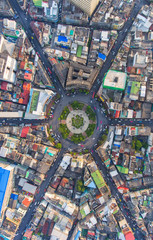 Aerial view, Road roundabout, Expressway with car lots in the city in Thailand.  beautiful Street , downtown, cityscape, Top view. Background