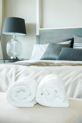 Fototapeta na wymiar White towels with bedroom interior background