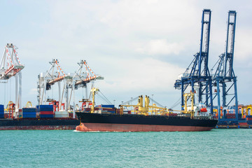 container ship in import export and business logistic.By crane ,Trade Port , Shipping,cargo to...
