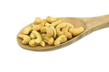 Roasted salted cashews isolated on a white background