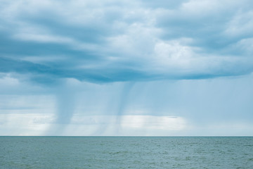Raining cloud seascape