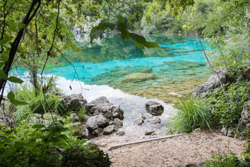 Fototapeta premium Enchanted Lake. The crystalline waters of Cornino Lake. Friuli
