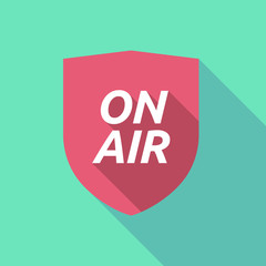 Long shadow shield with    the text ON AIR