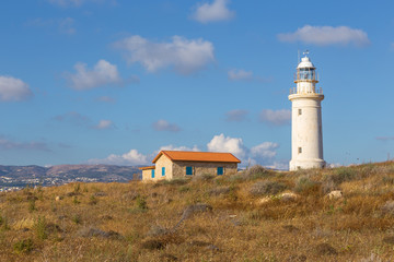 Fototapeta na wymiar Paphos Lighthouse, well known lighthouse on the island Cyprus, near town Paphos, Cyprus