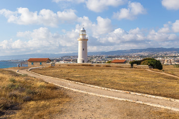 Fototapeta na wymiar Paphos Lighthouse, well known lighthouse on the island Cyprus, near town Paphos, Cyprus
