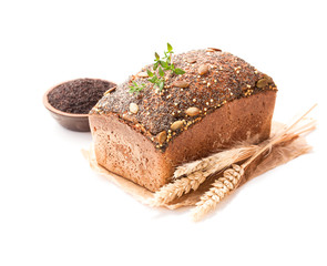 Homemade  wholemeal rye bread with poppy seeds isolated on white