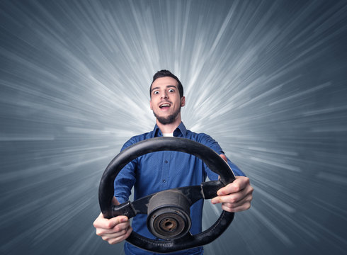 Man holding steering wheel