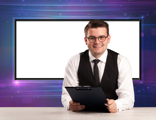 Television program host with big copy screen in his back
