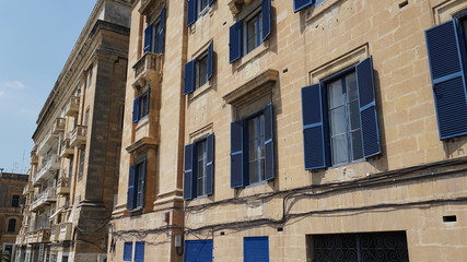 Fototapeta na wymiar Blue window shutters