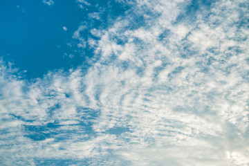 Fototapeta na wymiar Fantastic soft white clouds against blue sky background