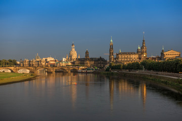 Fototapeta na wymiar The old buildings in city Dresden against sky