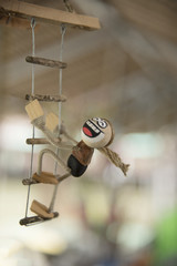 Coconut shell doll for mobile hanging