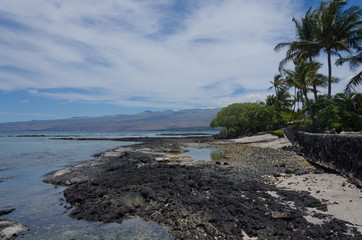 Walking on beach in Puako village