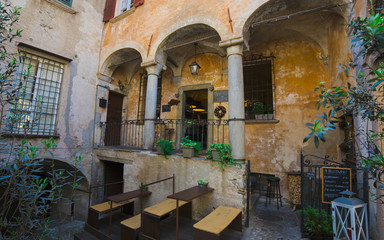 Fototapeta na wymiar Romantic restaurant in the old town of Cannobio - Lago Maggiore, Verbania, Piemont, Italy