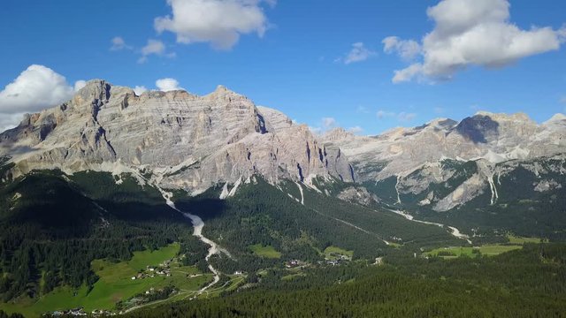 Fantastic landscape on the Dolomites. Drone aerial view on the peaks called Sas Crusc, Lavarela, Conturines and Pizes de Fanis. Place is Alta Badia, Sud Tirol, Italy