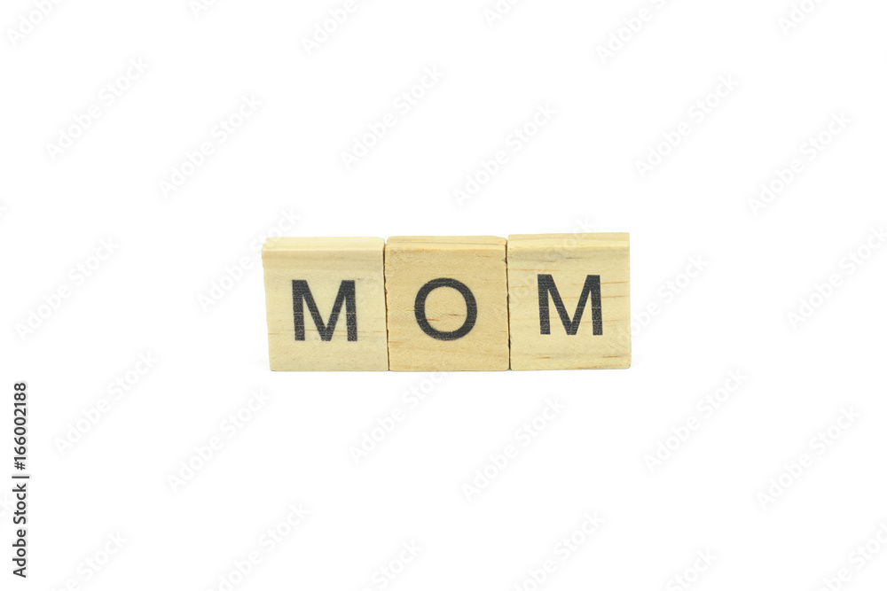 Wall mural Text wooden blocks spelling the word mom on white background