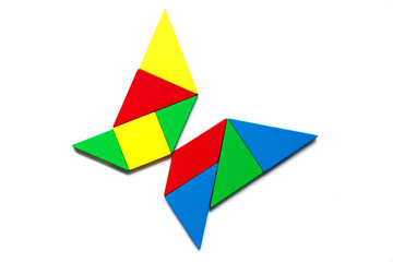 Fototapeta na wymiar Colorful tangram as butterfly shape on white background