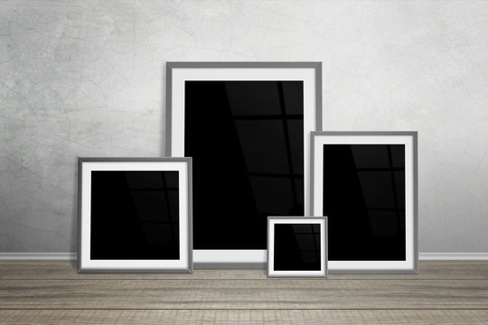 Multiple frames leaning on wall. Isolated for mockup.
