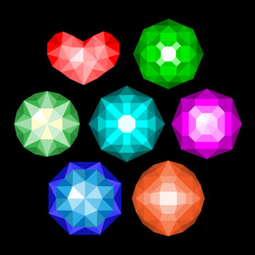 Set of multi-colored classic round brilliant cut gems.