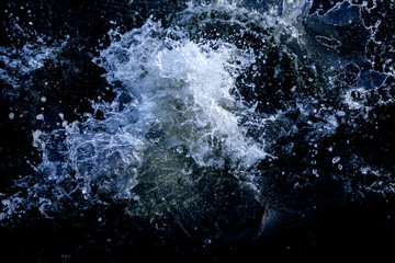 Water splashes on a black background