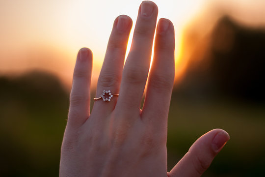 Engagement ring at sunset
