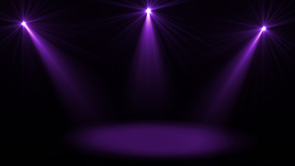 Stage lights. Several projectors in the dark. Purple spotlight strike through the darkness
