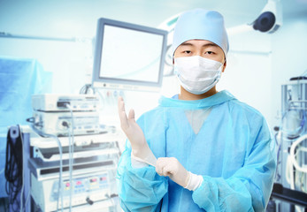Fototapeta na wymiar Young Asian doctor on white background