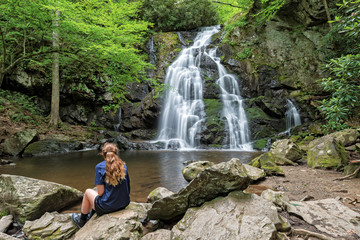 Young Woman Viewing Spruce Flats Falls