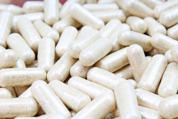 Pills. White capsules.